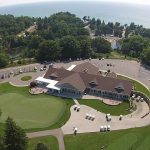 Panoramic view of a lush green golf course at Lincoln Hills Golf Club. Smooth