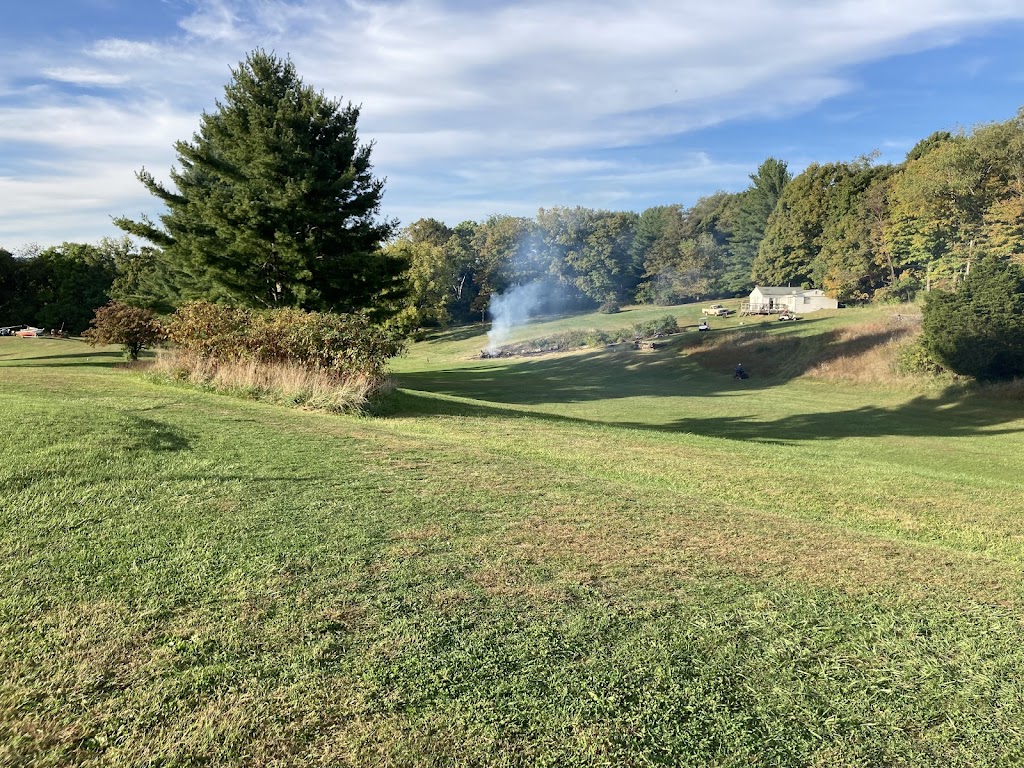 Panoramic view of a lush green golf course at Loch Lowman Golf Course. Smooth