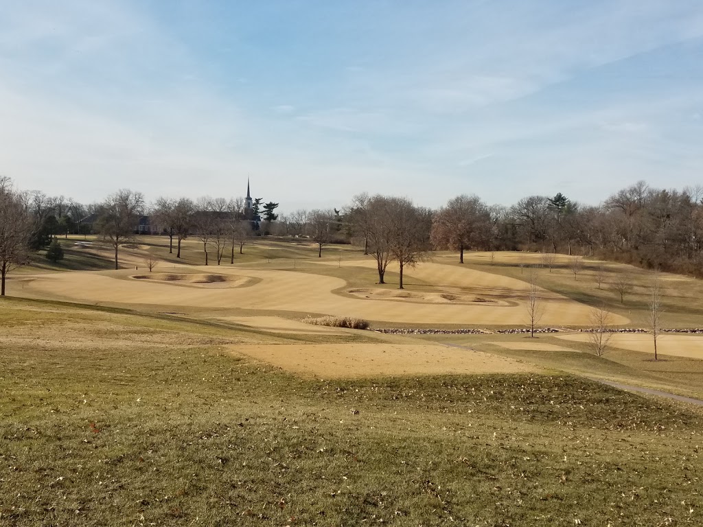 Panoramic view of a lush green golf course at Log Cabin Club. Smooth