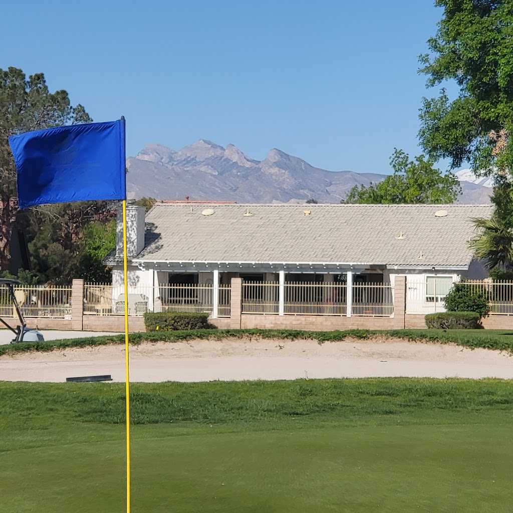 Panoramic view of a lush green golf course at Los Prados Golf & Country Club. Smooth