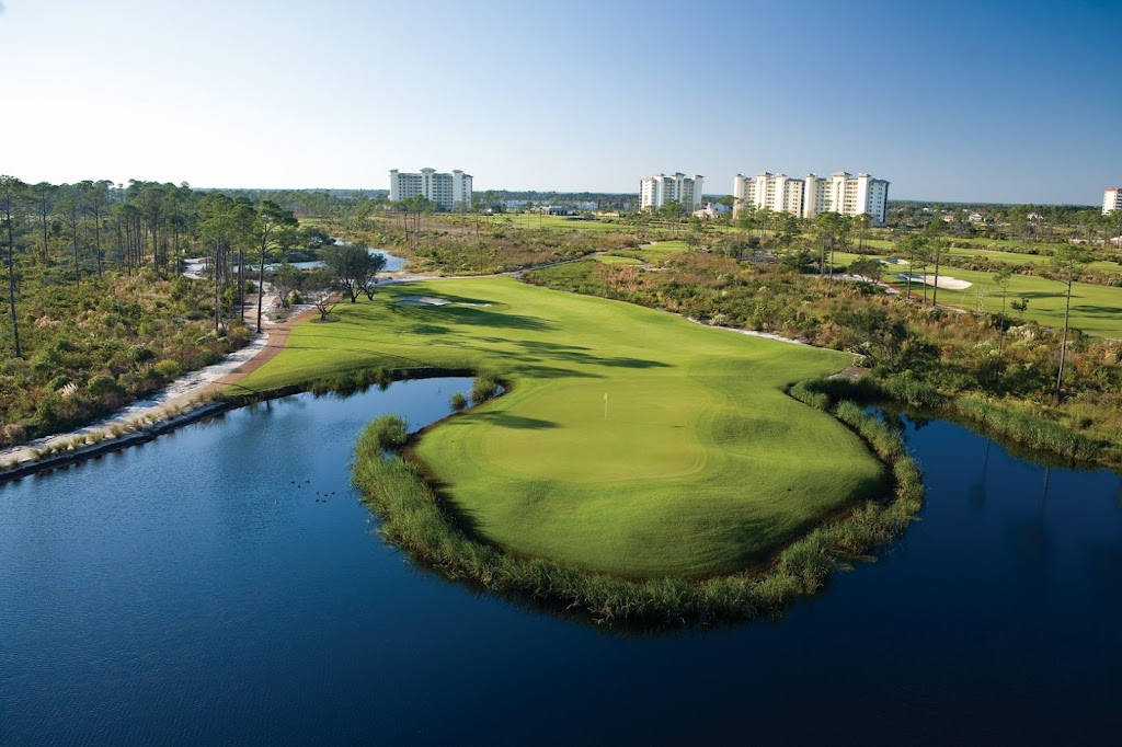 Panoramic view of a lush green golf course at Lost Key Golf Club. Smooth