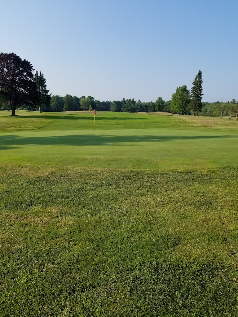 Panoramic view of a lush green golf course at Maine Golf Center Freeport. Smooth