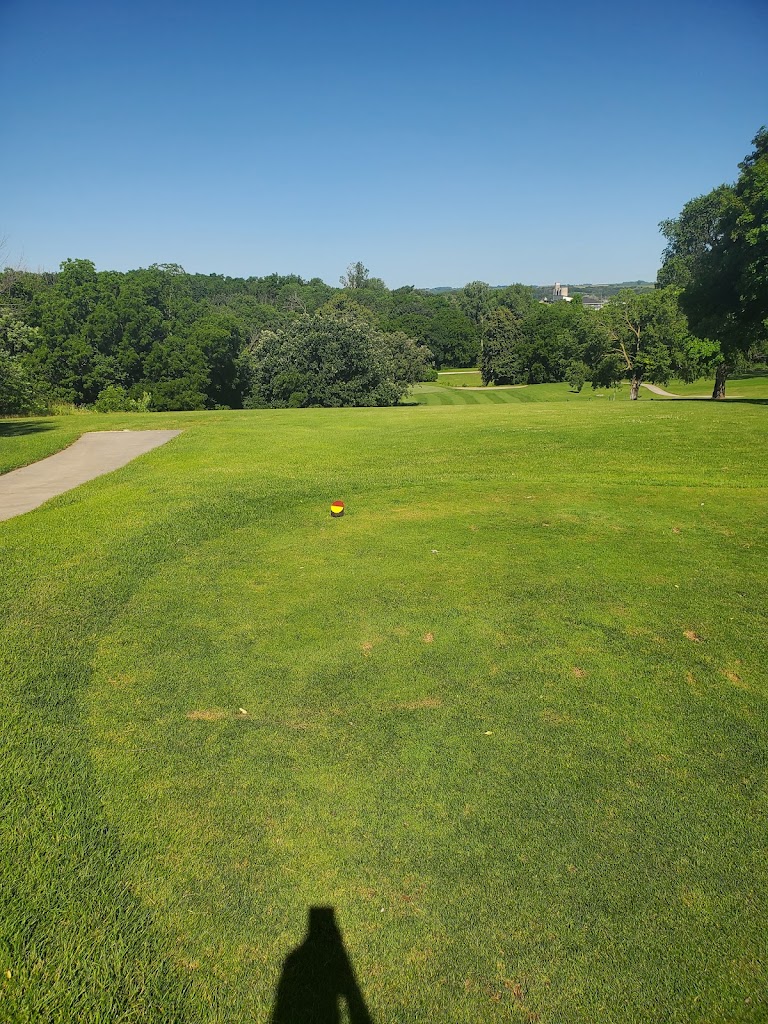 Panoramic view of a lush green golf course at Majestic Hills Golf Course. Smooth