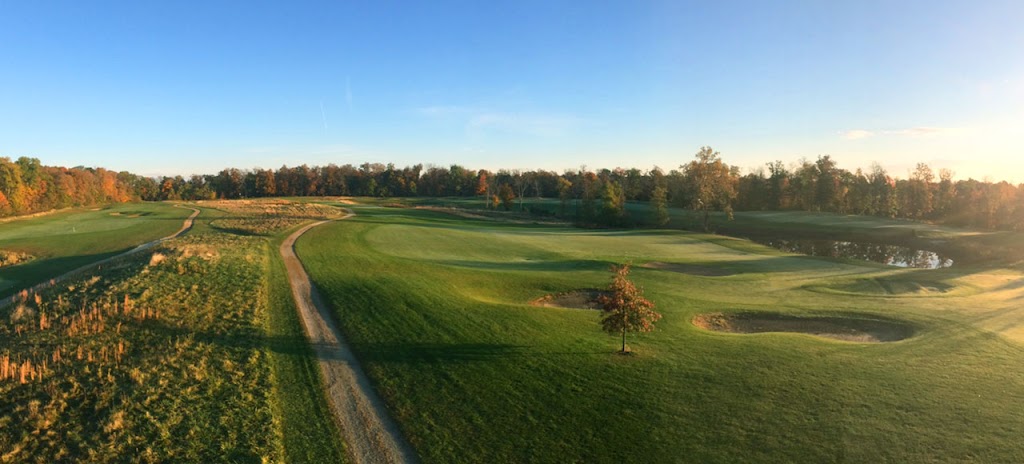 Panoramic view of a lush green golf course at Majestic Springs Golf Club. Smooth