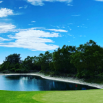 Panoramic view of a lush green golf course at Makalei Golf Club. Smooth