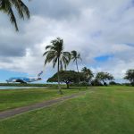 Panoramic view of a lush green golf course at Mamala Bay Golf Course. Smooth