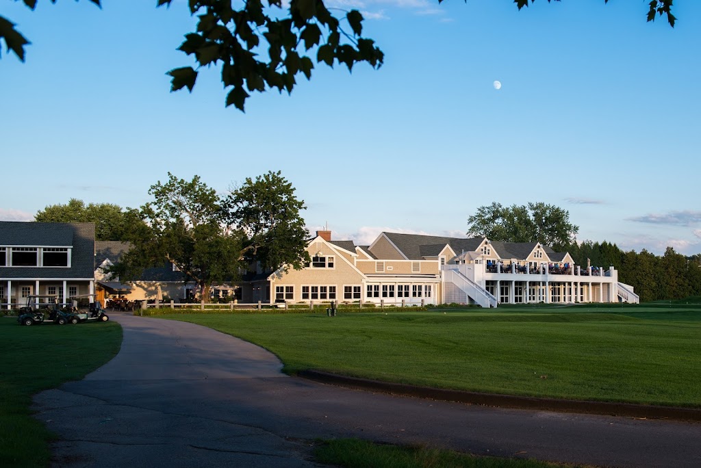 Panoramic view of a lush green golf course at Manchester Country Club - NH. Smooth