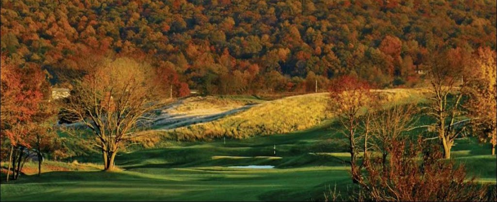 Panoramic view of a lush green golf course at Maryland National Golf Club. Smooth