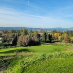 Panoramic view of a lush green golf course at McMenamins Edgefield Golf Course. Smooth