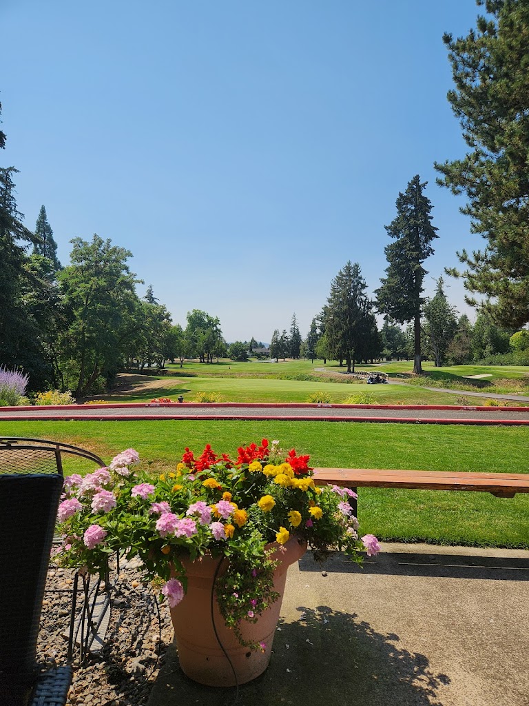 Panoramic view of a lush green golf course at McNary Golf Club. Smooth