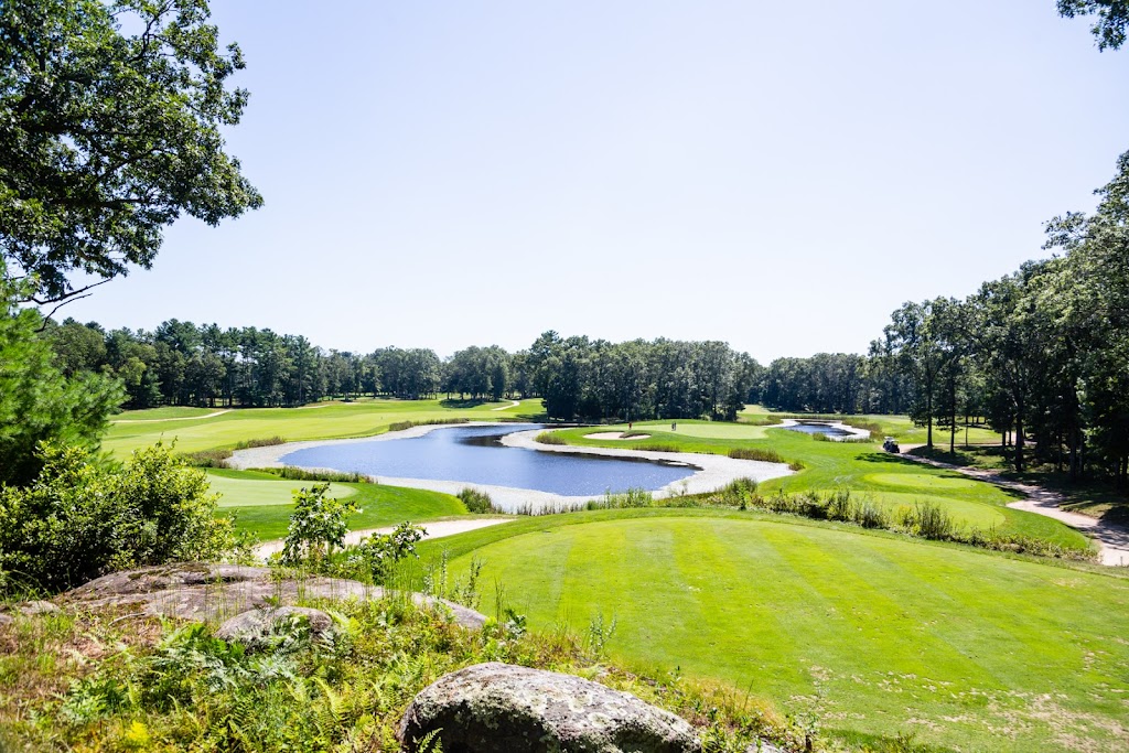 Panoramic view of a lush green golf course at Meadow Brook Golf Course. Smooth