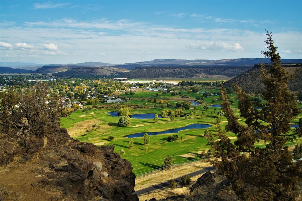 Panoramic view of a lush green golf course at Meadow Lakes Golf Course. Smooth