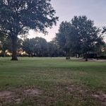 Panoramic view of a lush green golf course at MeadowBrook Country Club. Smooth