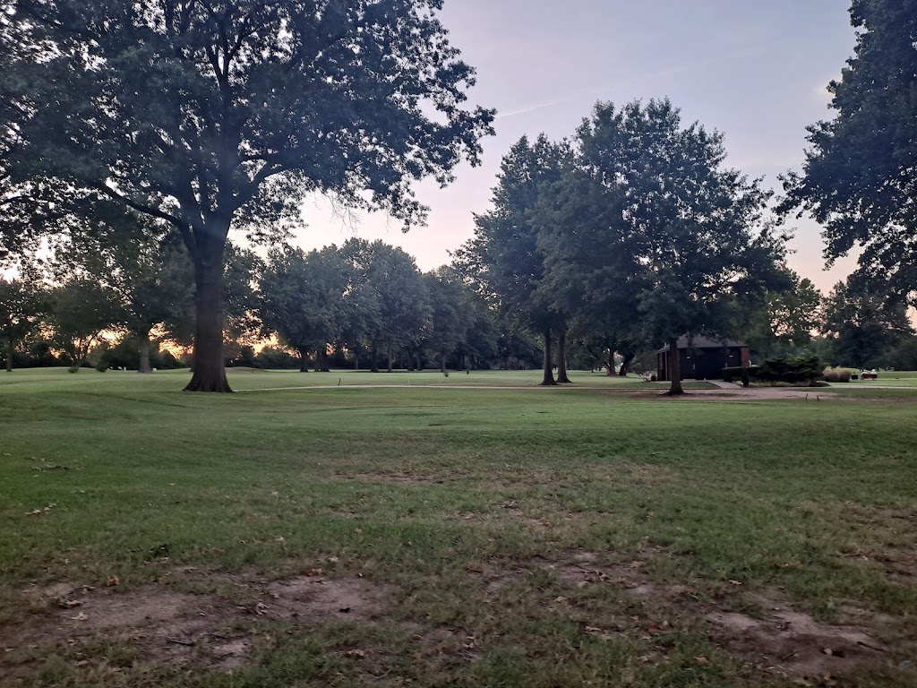 Panoramic view of a lush green golf course at MeadowBrook Country Club. Smooth