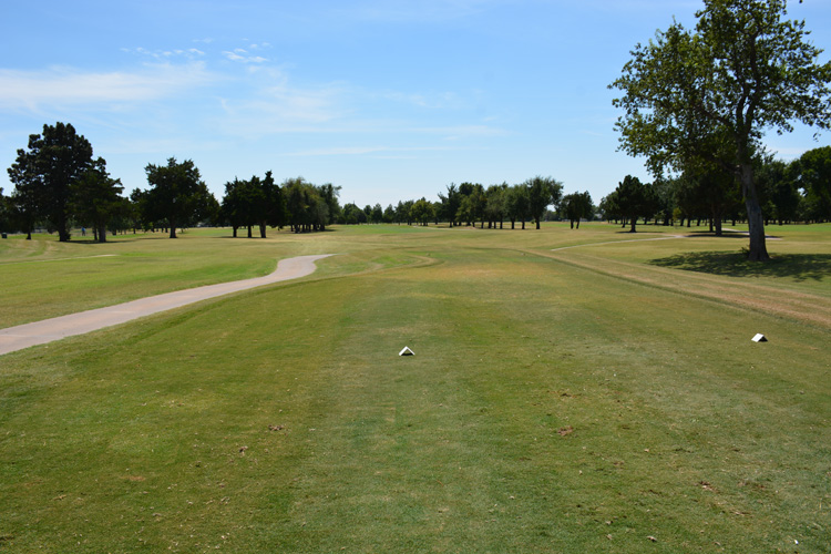 Panoramic view of a lush green golf course at Meadowlake Golf Course. Smooth