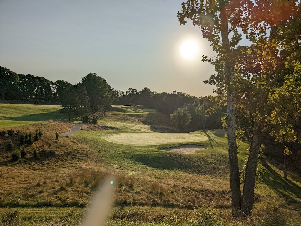 Panoramic view of a lush green golf course at Midville Golf Club. Smooth