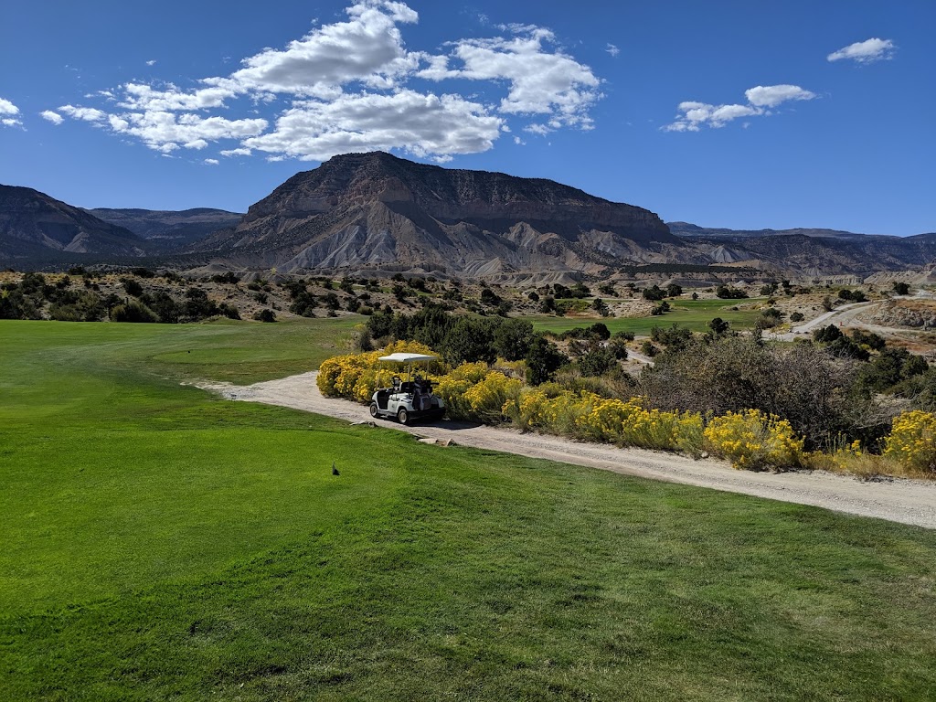 Panoramic view of a lush green golf course at Millsite Golf Course. Smooth