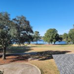 Panoramic view of a lush green golf course at Money Hill Golf & Country Club. Smooth