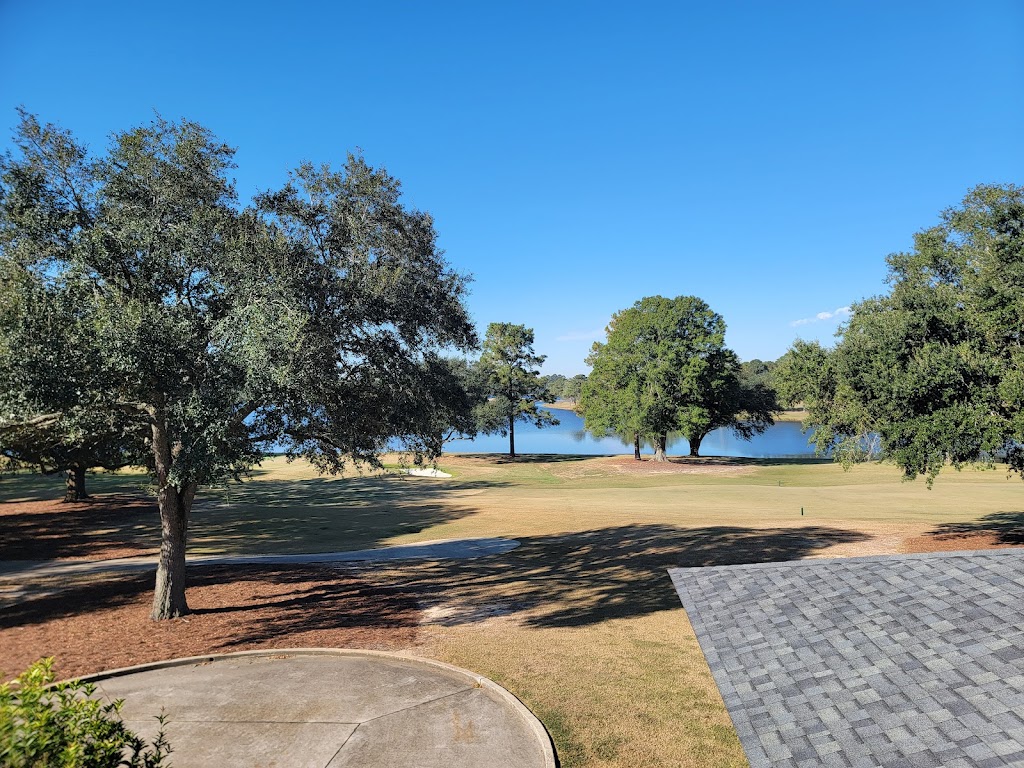 Panoramic view of a lush green golf course at Money Hill Golf & Country Club. Smooth