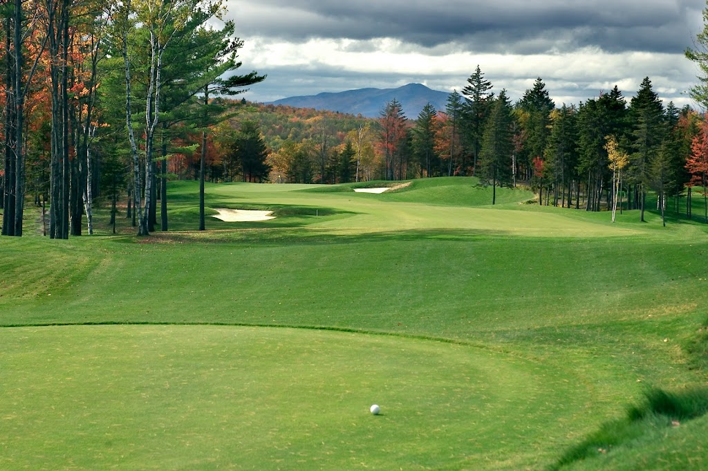 Panoramic view of a lush green golf course at Montcalm Golf Club. Smooth