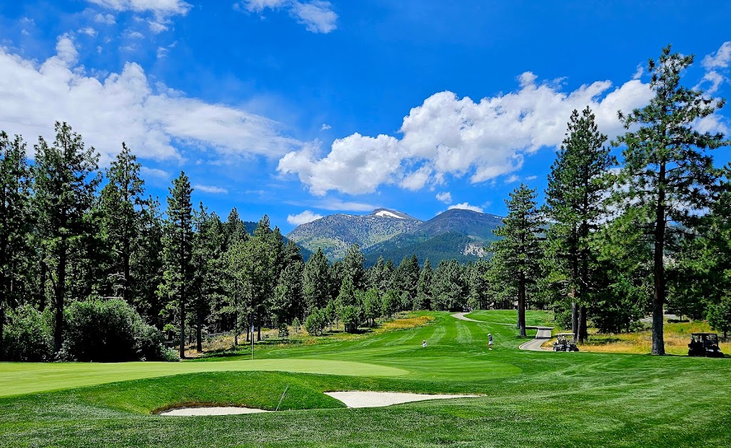 Panoramic view of a lush green golf course at Montreux Golf & Country Club. Smooth