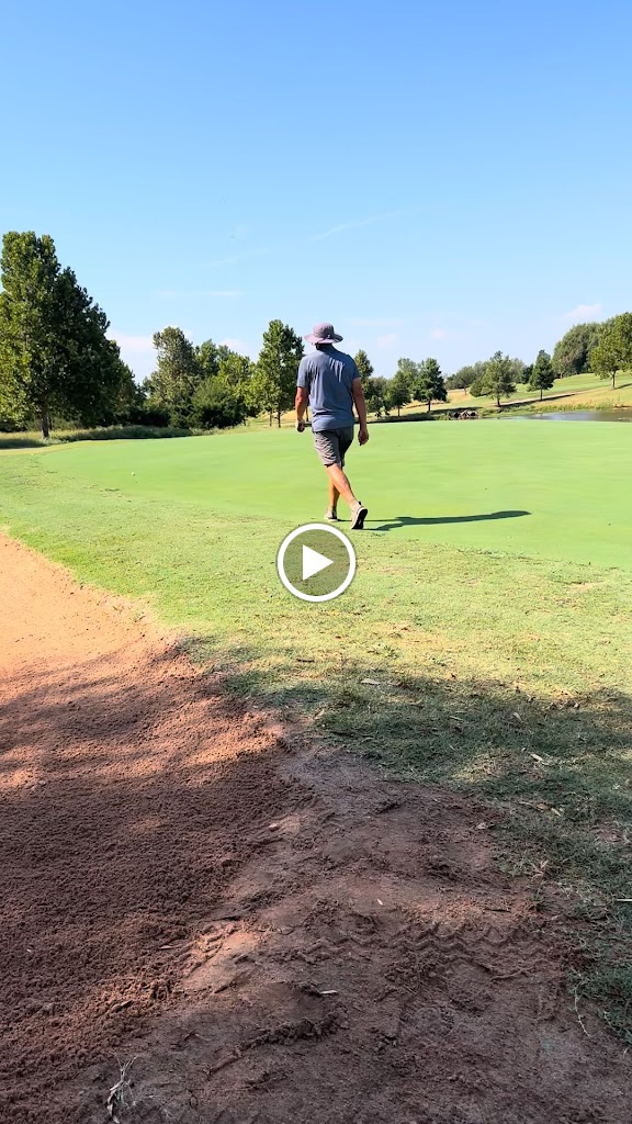 green grass with the flag in the hole.