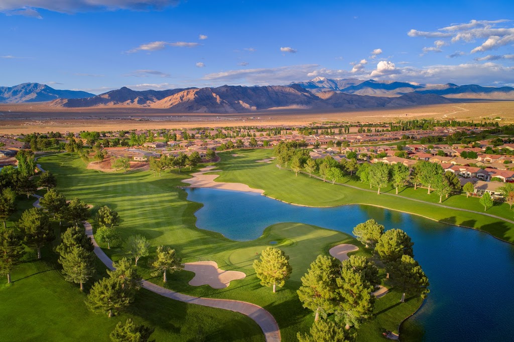 Panoramic view of a lush green golf course at Mountain Falls Golf Club. Smooth