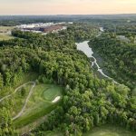 Panoramic view of a lush green golf course at My Old Kentucky Home Golf Course. Smooth