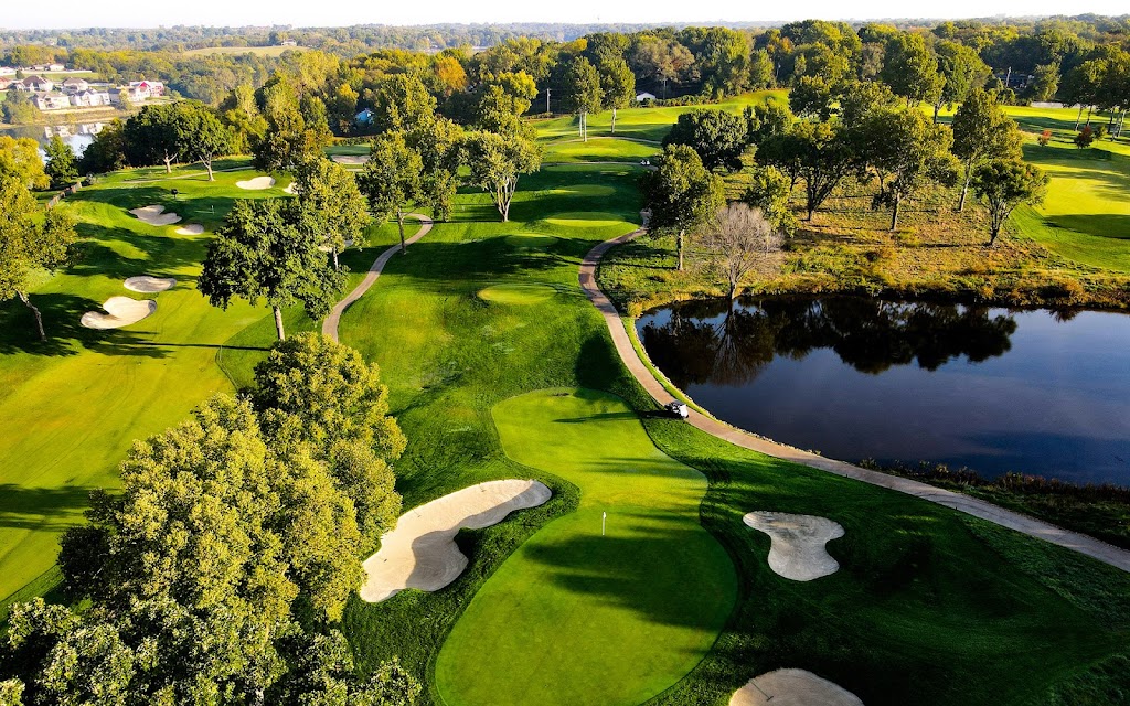 Panoramic view of a lush green golf course at National Golf Club-Kansas City. Smooth