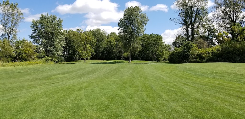 Panoramic view of a lush green golf course at National Golf Links. Smooth