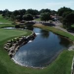 Panoramic view of a lush green golf course at New Mexico Military Institute Golf Course. Smooth