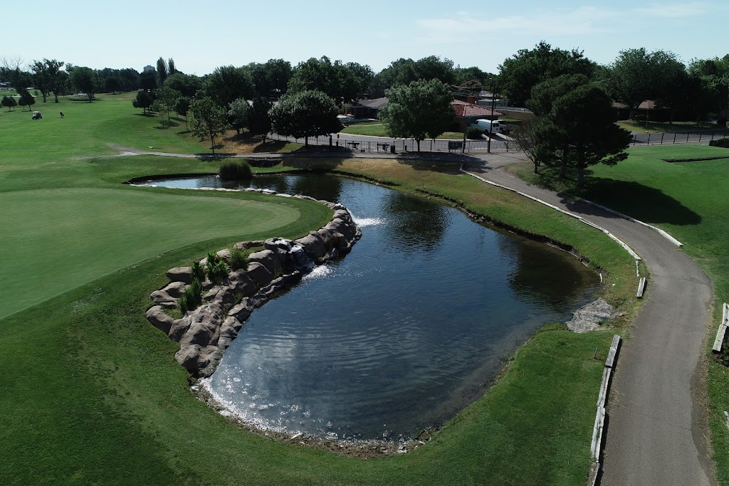 Panoramic view of a lush green golf course at New Mexico Military Institute Golf Course. Smooth