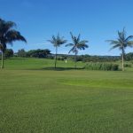 Panoramic view of a lush green golf course at North Kohala Golf Park. Smooth