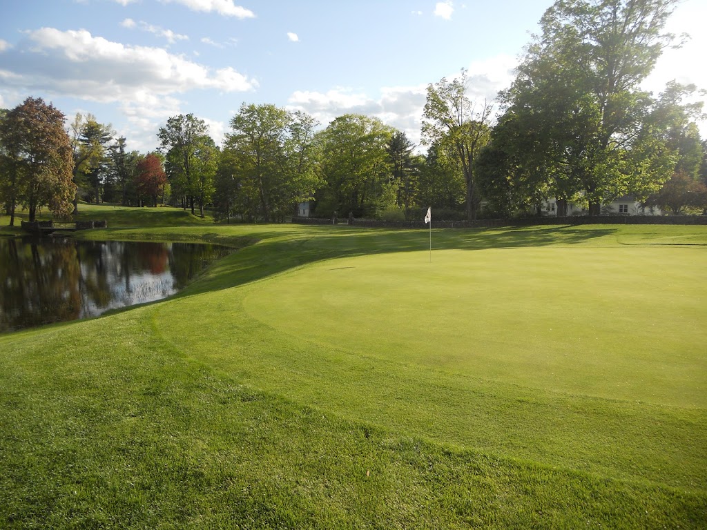 Panoramic view of a lush green golf course at Northfield Golf Club. Smooth