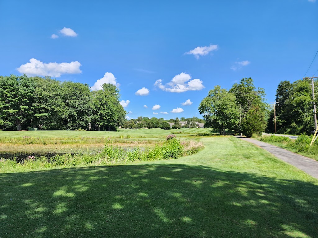 Panoramic view of a lush green golf course at Norton Country Club. Smooth