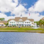 Panoramic view of a lush green golf course at ONE Club Golf Course Gulf Shores. Smooth