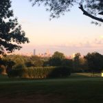 Panoramic view of a lush green golf course at Oakley Country Club. Smooth