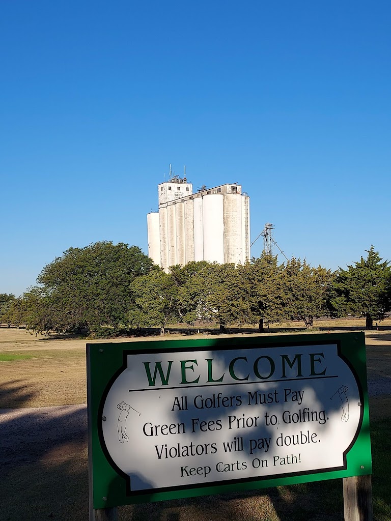 Panoramic view of a lush green golf course at Oakley Country Club. Smooth