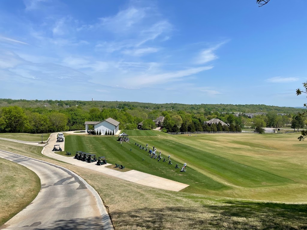 Panoramic view of a lush green golf course at Oaks Country Club. Smooth