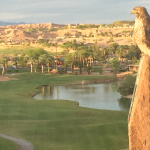 Panoramic view of a lush green golf course at Oasis Golf Club. Smooth