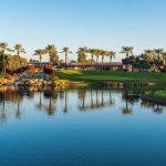 Panoramic view of a lush green golf course at Ocotillo Golf Club. Smooth