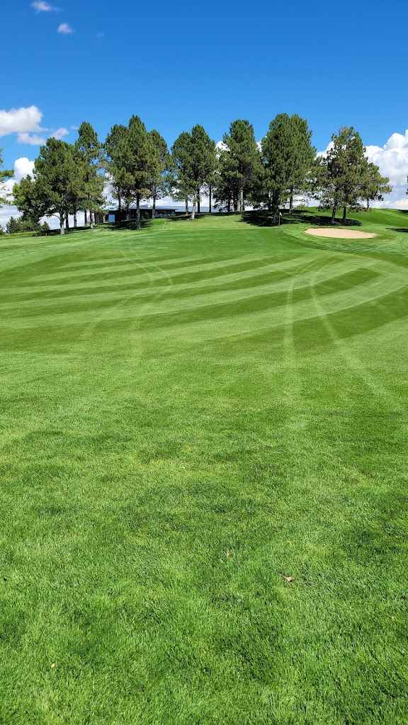 Panoramic view of a lush green golf course at Old Baldy Club. Smooth