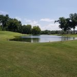 Panoramic view of a lush green golf course at Old Hickory Country Club. Smooth