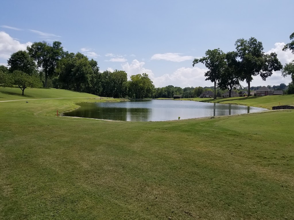 Panoramic view of a lush green golf course at Old Hickory Country Club. Smooth