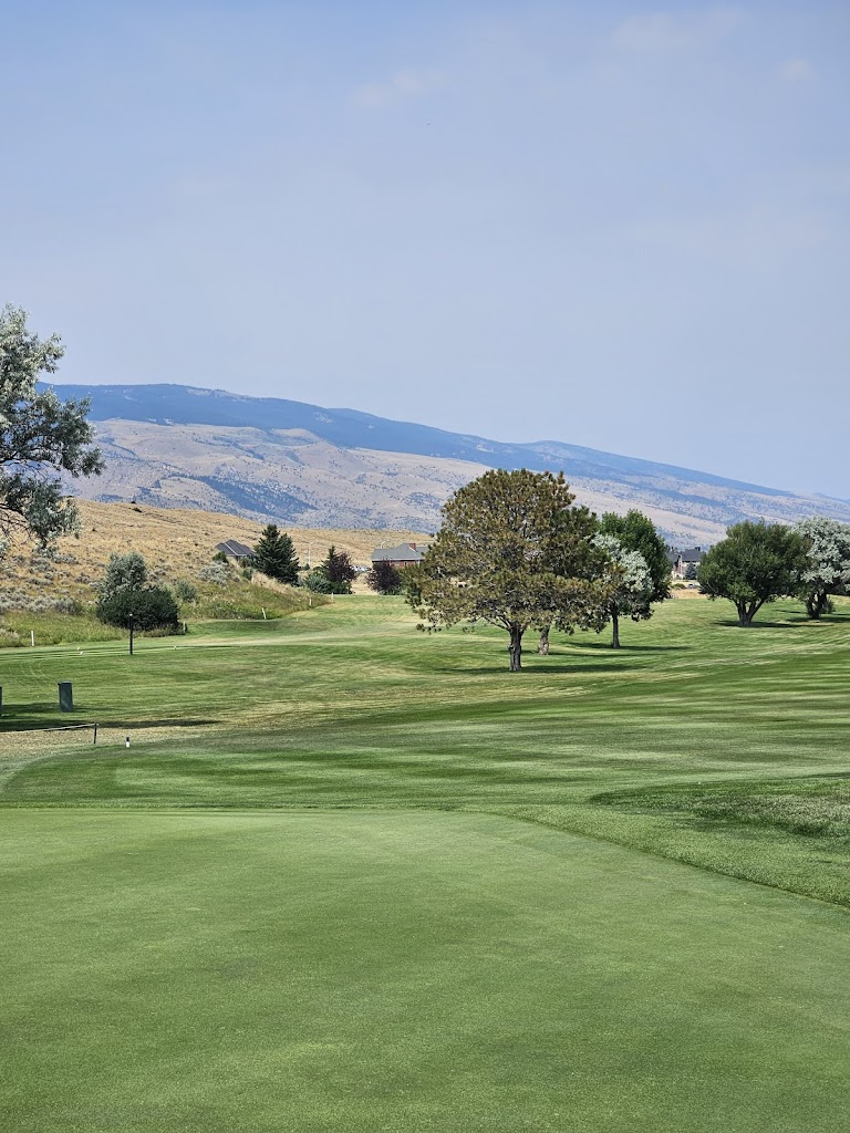 Panoramic view of a lush green golf course at Olive Glenn Golf Club. Smooth