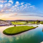 Panoramic view of a lush green golf course at Payne's Valley Golf Course. Smooth