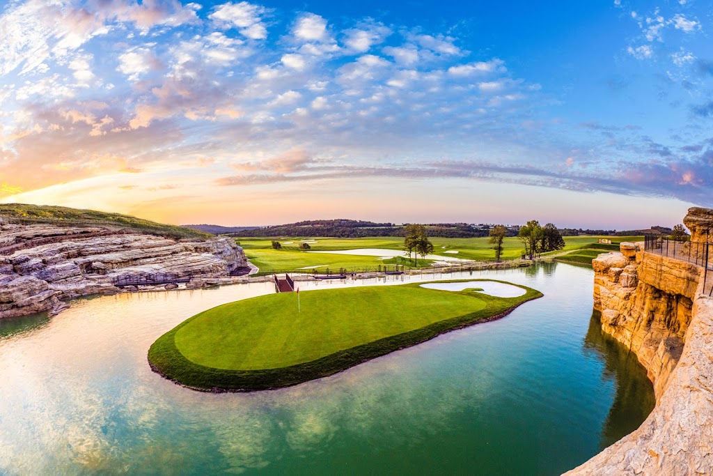 Panoramic view of a lush green golf course at Payne's Valley Golf Course. Smooth