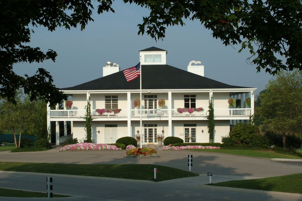 Panoramic view of a lush green golf course at Pebble Creek Golf Course