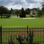 green grass with the flag in the hole.