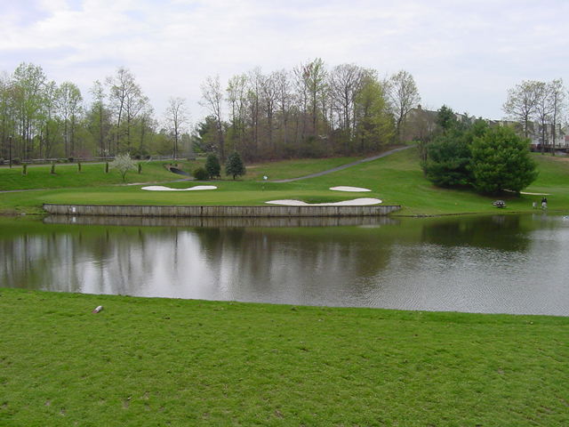 Panoramic view of a lush green golf course at Penderbrook Golf Club. Smooth